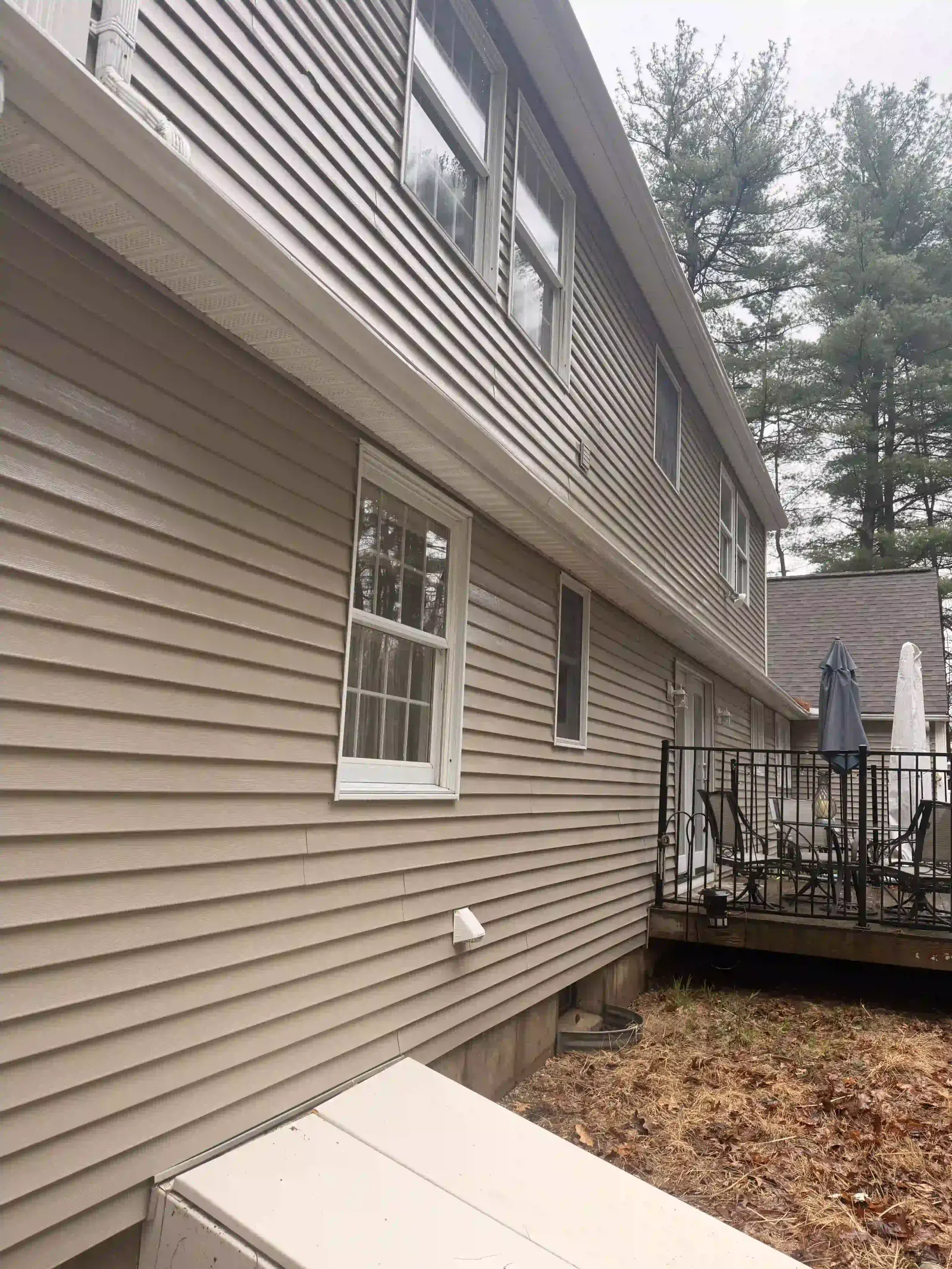 Freshly cleaned other side house after a pressure washing visit in Southwick, MA